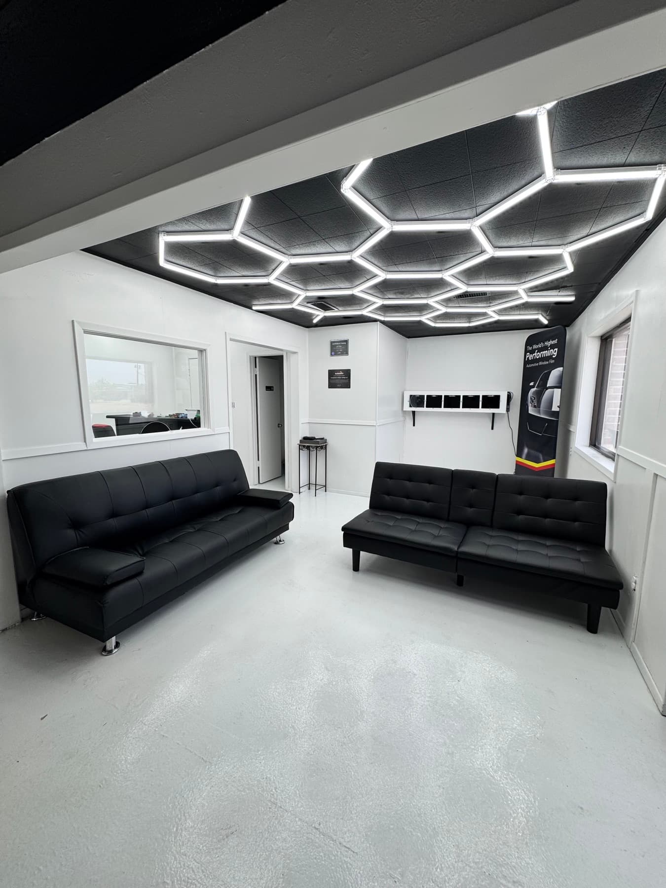 Waiting room seating area inside Presidential Tint in Midland, Texas.